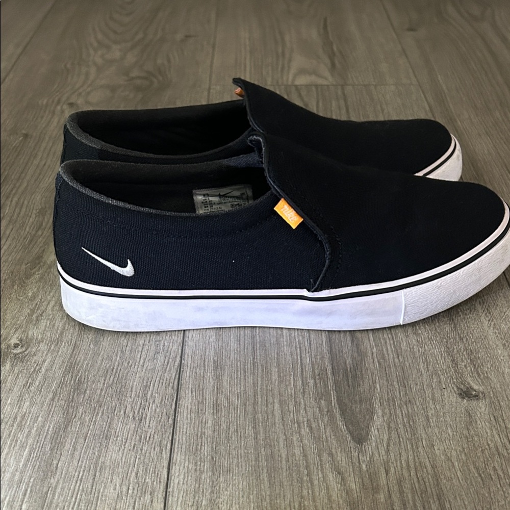 Nike Black Canvas Slip-Ons with White Sole
